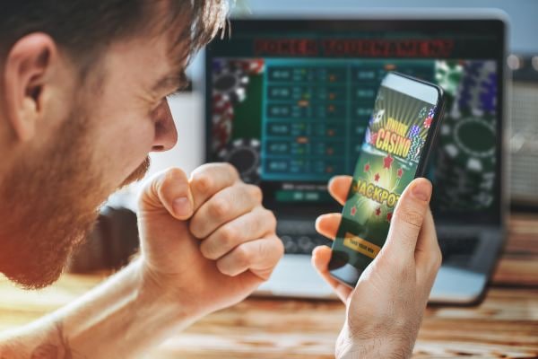 rivalry Casino games interface showing slots and live dealer options